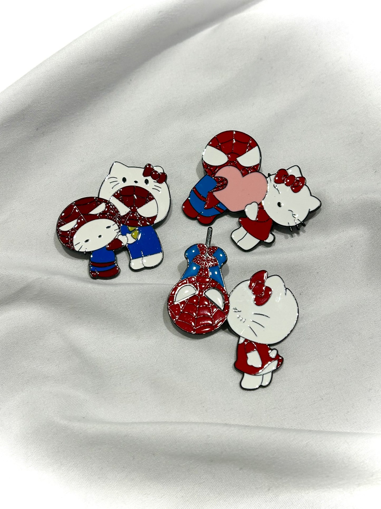 Assorted Hello Kitty & Spiderman pins